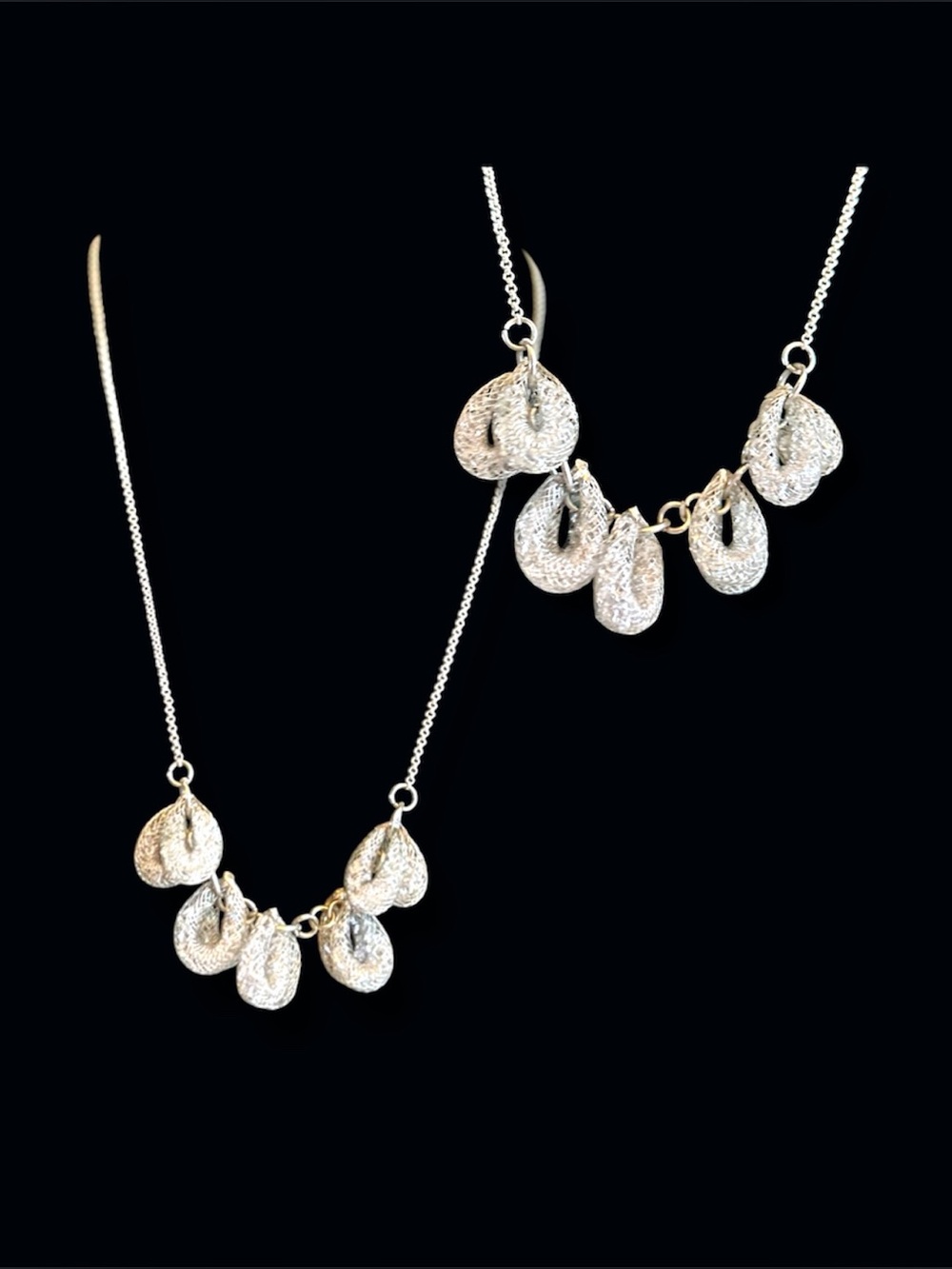 Elegant Silver Necklace with Shimmering Crystal Tear Drop Pendants